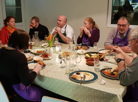 Group enjoying a dining experience at Dingle Cookery School